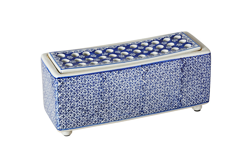 11-inch-wide floral arranger is a perfect addition to your home decor. With its intricate blue floral pattern and modern rectangular shape, this piece offers both functionality and elegance, making it easy to arrange flowers in a way that enhances any room.