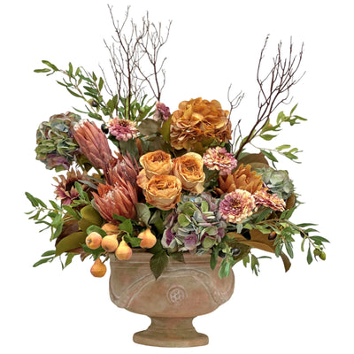 Hand-crafted mixed fall floral arrangement in an Italia urn, featuring golden roses, dahlias, branches, and berries against a white background