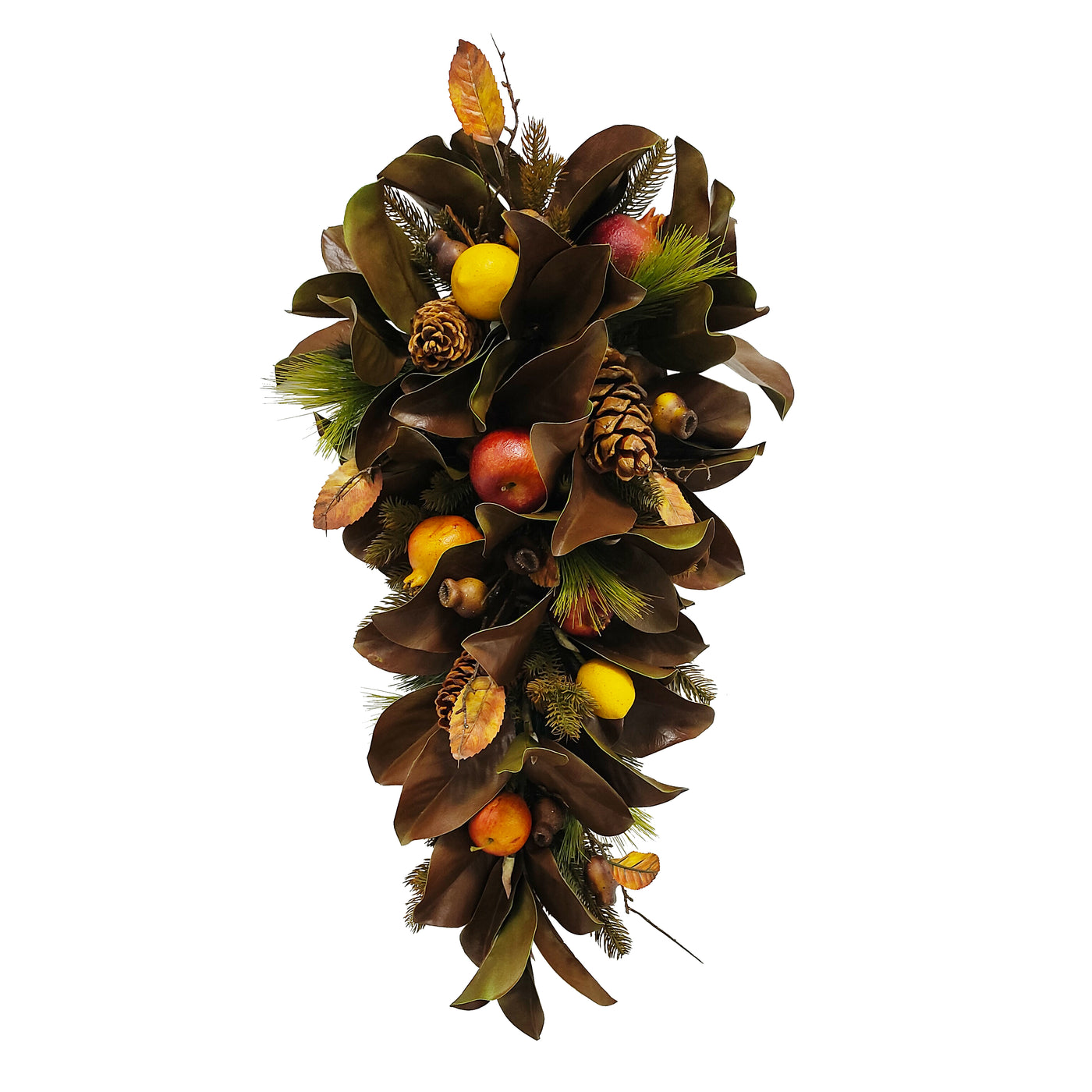 Hand-crafted magnolia leaf and fruit cone with lush greenery and fruit accents placed against white background